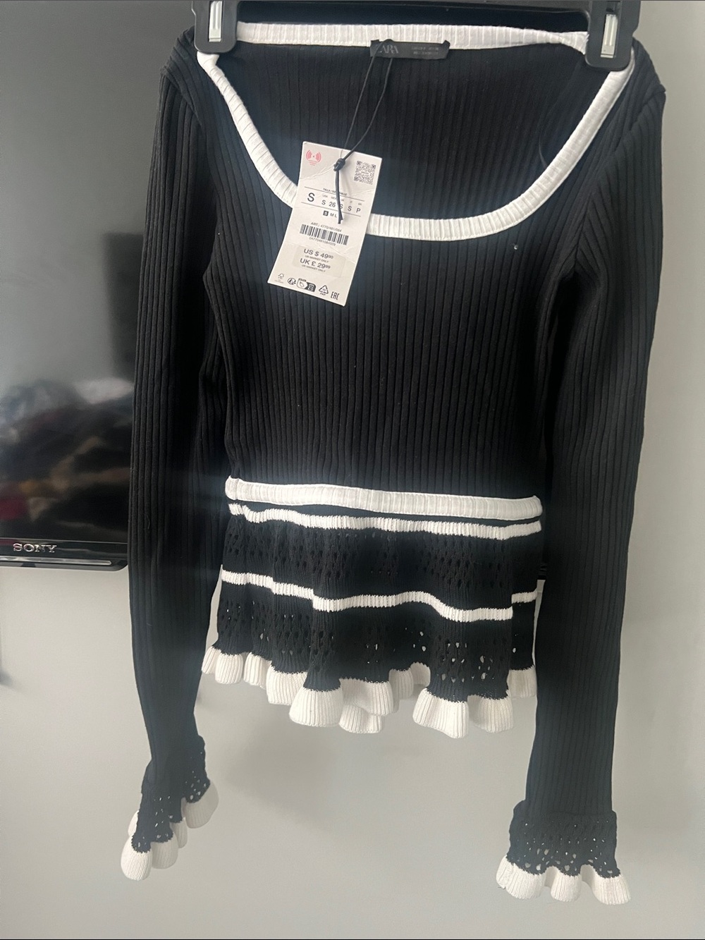 Zara Black and White Ribbed Peplum Long-Sleeve Top